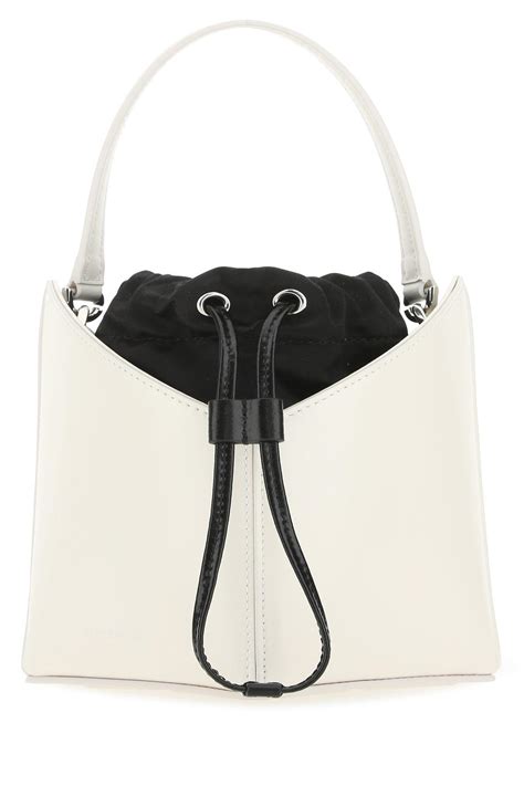 givenchy cut out bucket bag|Givenchy iconic black pouch.